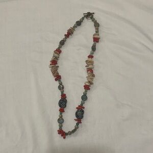 Elegant Beaded Necklace with Red and Blue Accents
